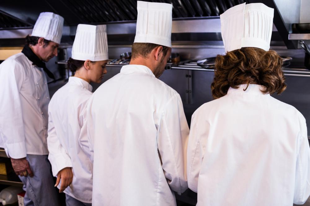 chef preparing food in kitchen